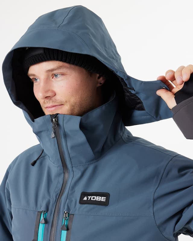 46_0c0366f4be-15-1-900123-222-tiro-v3-insulated-monosuit-orion-blue-men-060-full