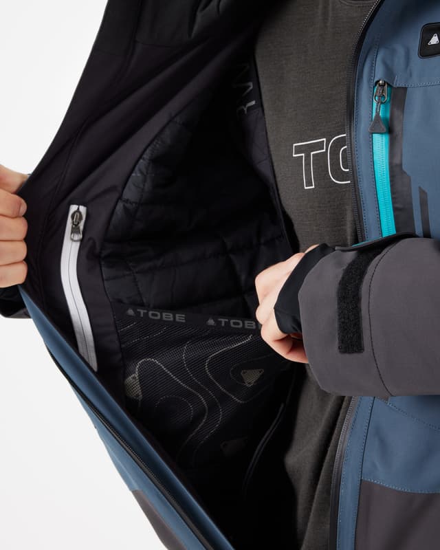 46_8300f95ac4-11-900123-222-tiro-v3-insulated-monosuit-orion-blue-men-064-full